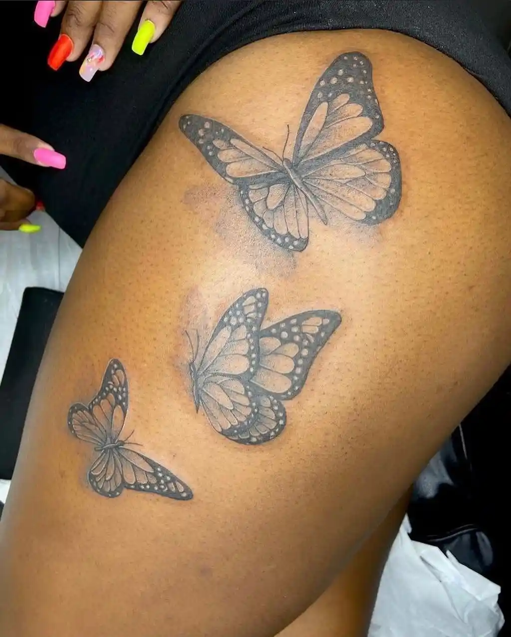 Thigh Tattoos for Women – Graceful Monarch Butterflies