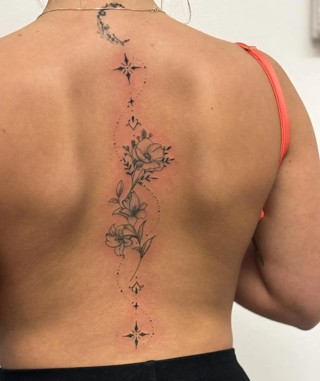 Delicate Floral Trail Back Tattoo for Women