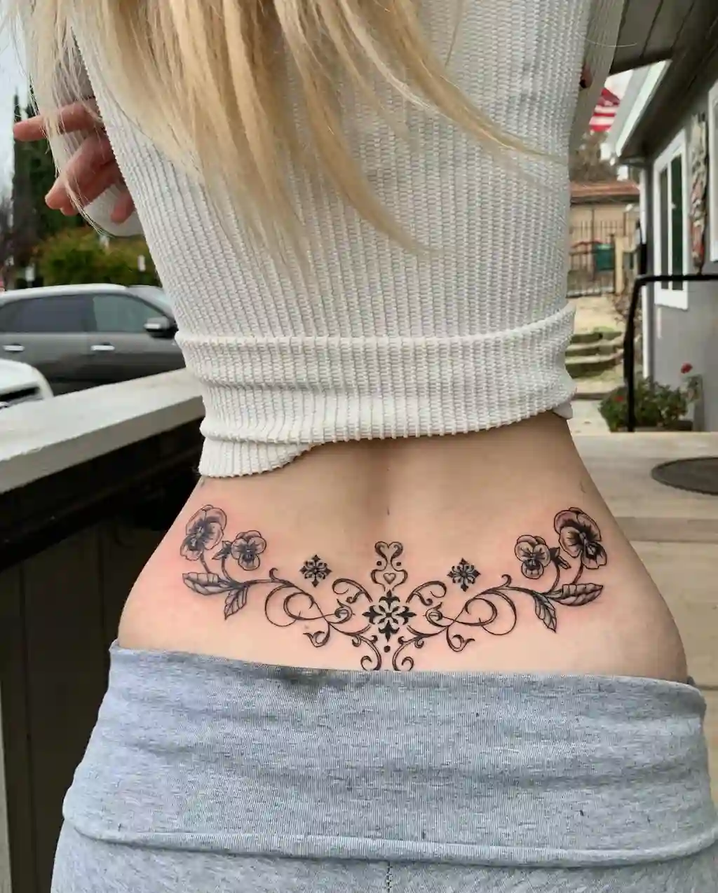 Floral Swirl Lower Back Tattoo