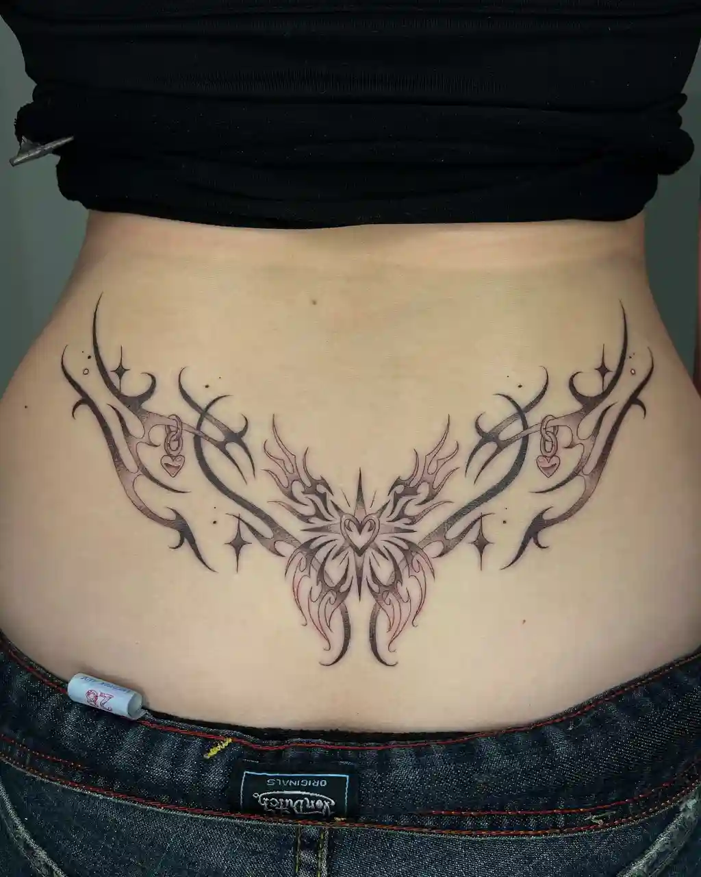 Tribal Butterfly Lower Back Tattoo