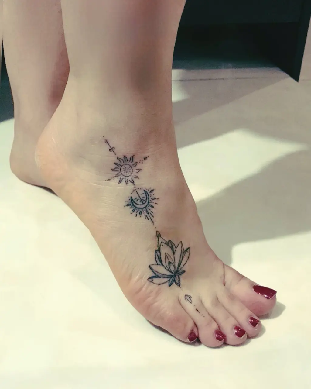 Celestial Lotus Foot Tattoos for Women