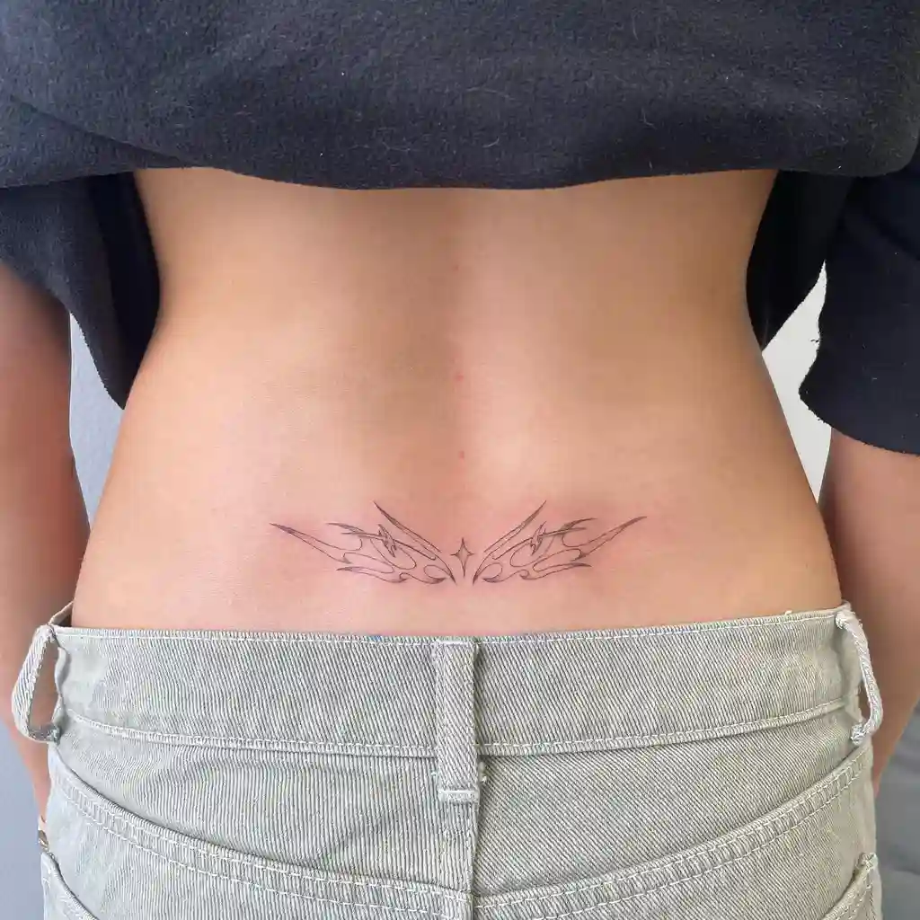 Minimalist Tribal Wings Lower Back Tattoos for Women