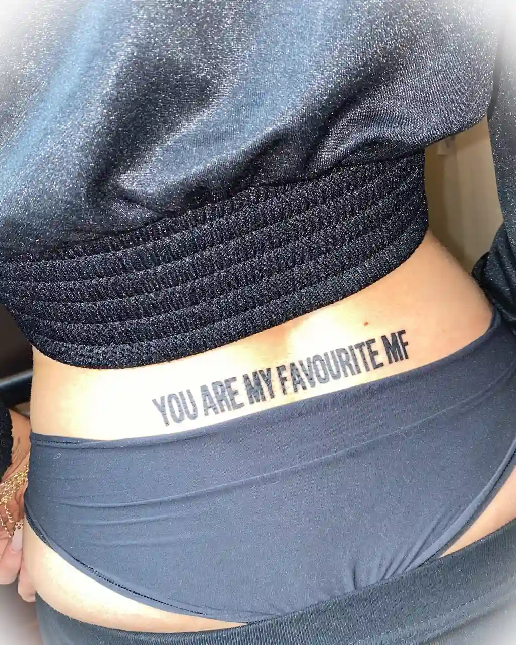 Bold Lettering Favorite MF Lower Back Tattoos for Women