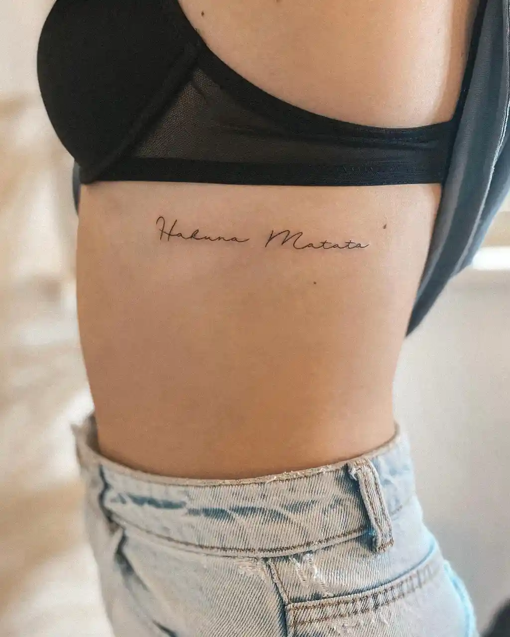 Hakuna Matata Script Rib Tattoos for Women