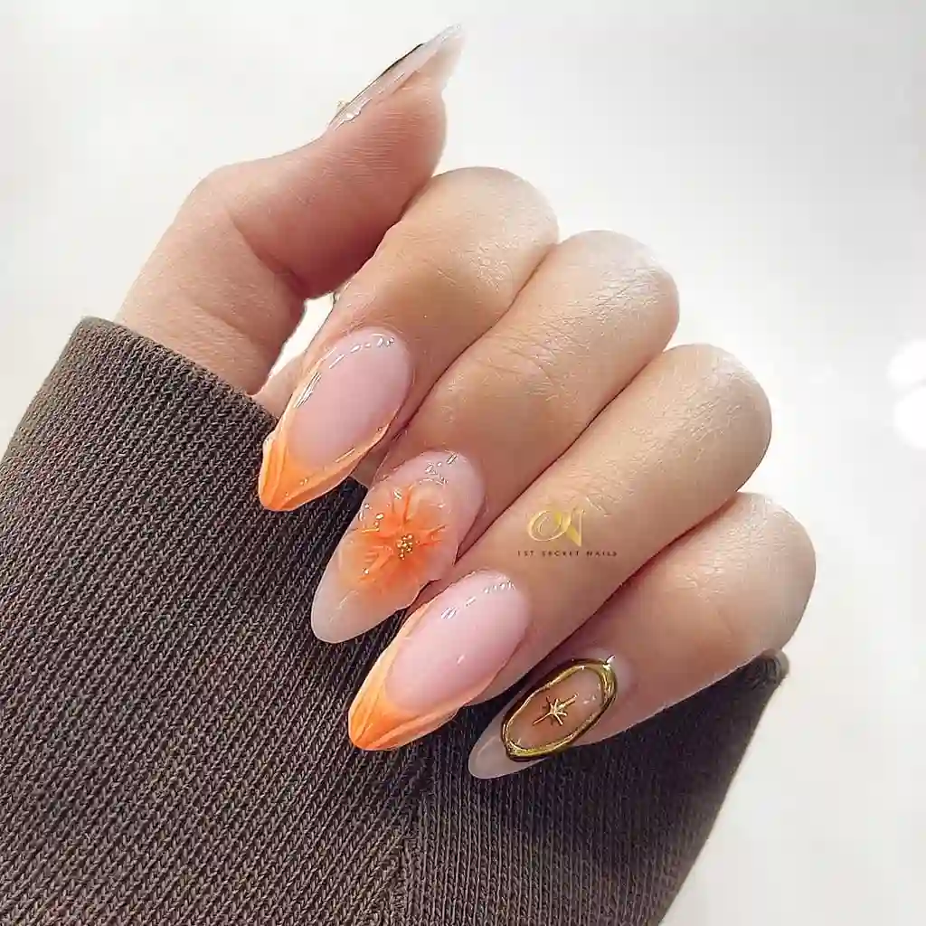 Floral Accent Orange Nails