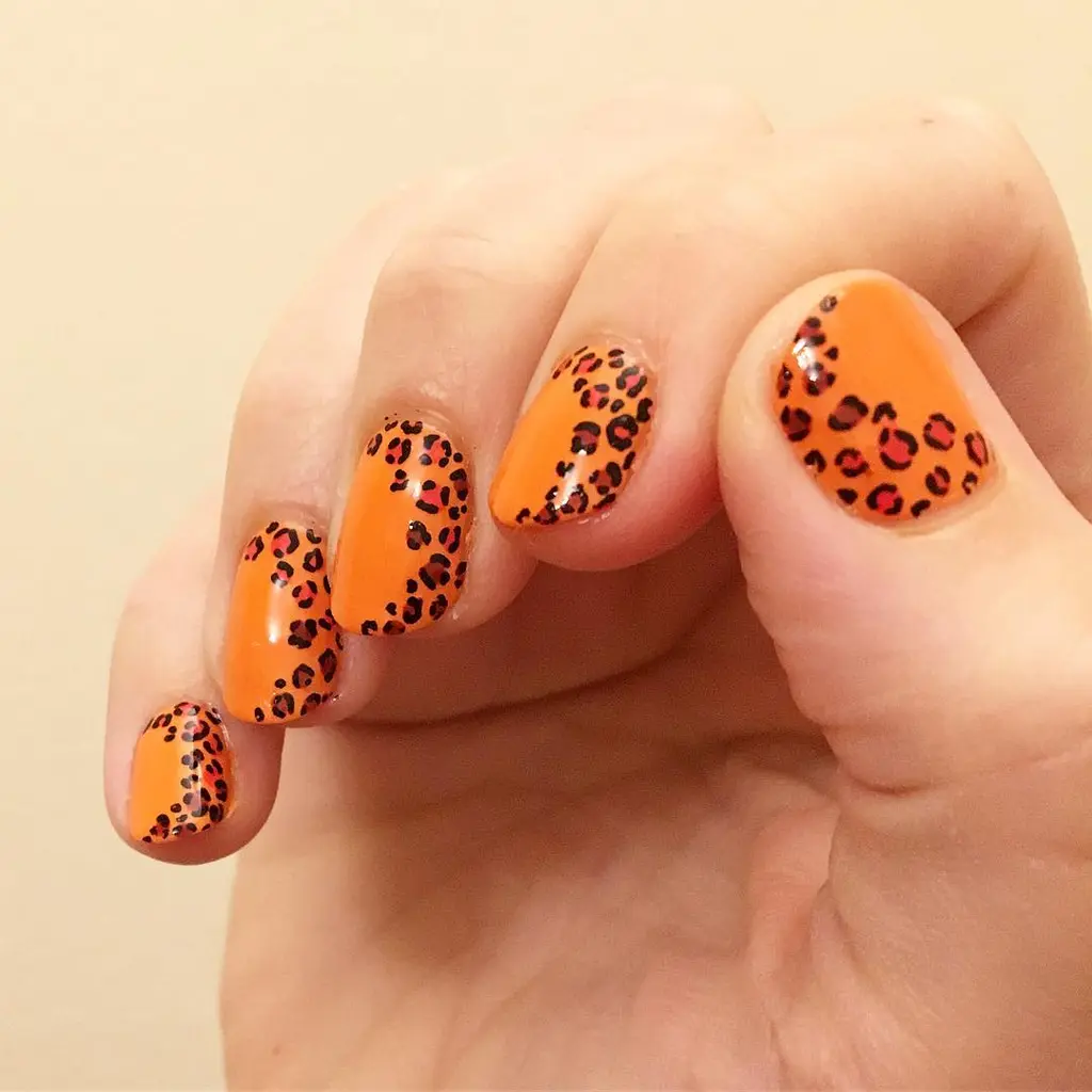 Leopard Accent Orange Nails