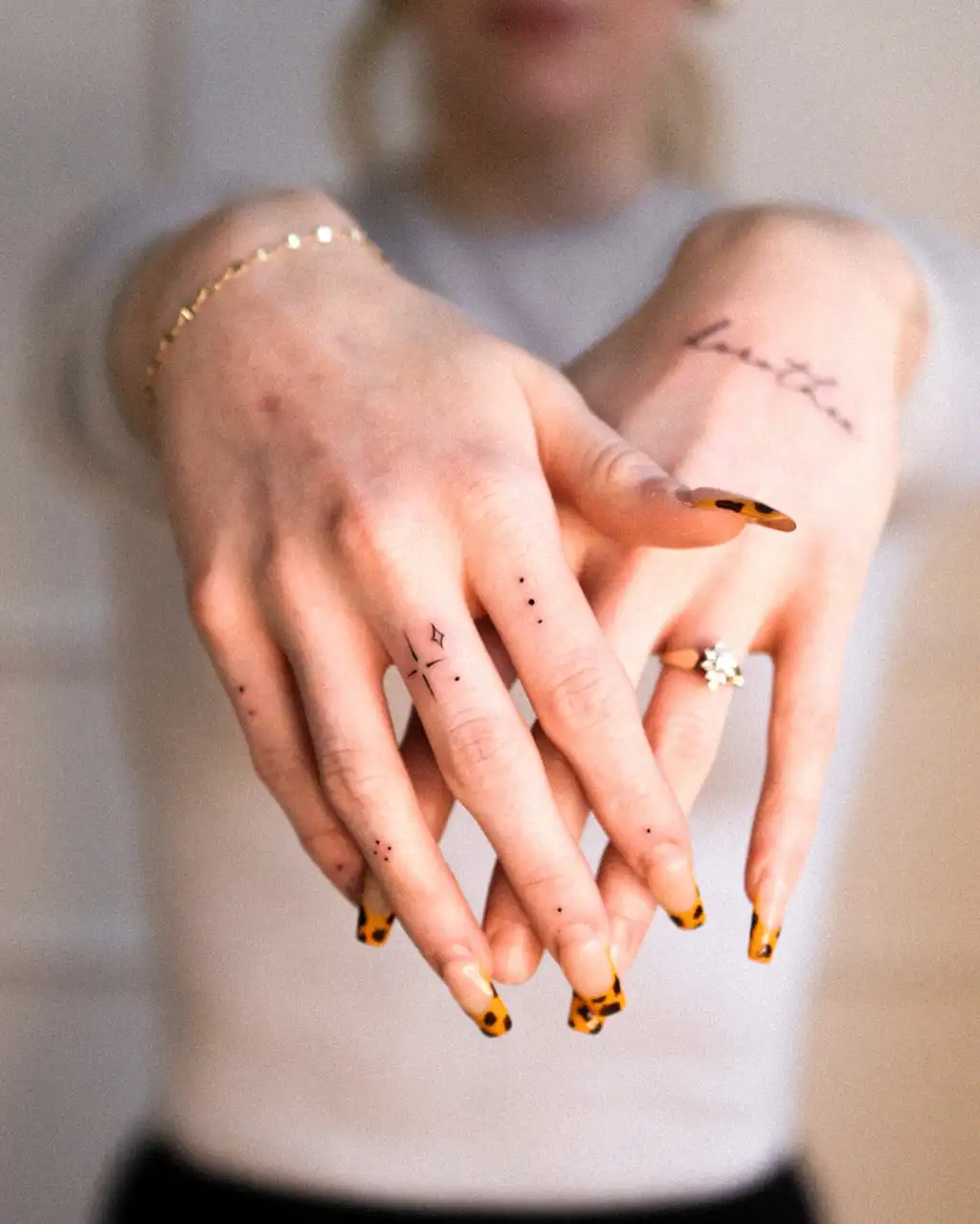 Dotted Finger Tattoos for Women