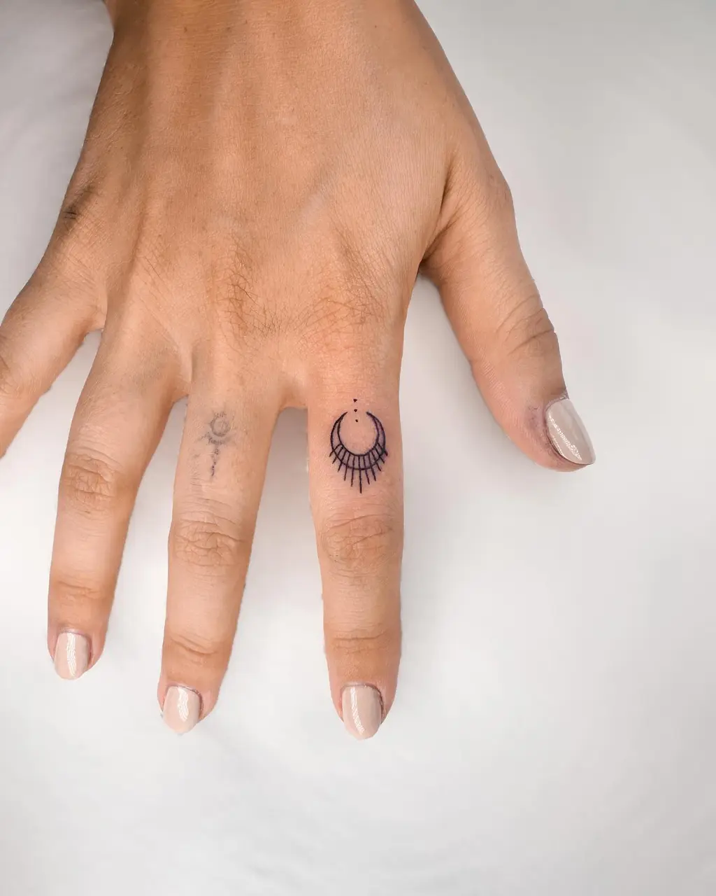 Finger Tattoos for Women with Crescent Moon and Rays